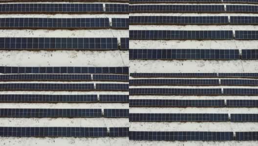 可再生能源业务与太阳能电池板在冬天的雪地里高清在线视频素材下载