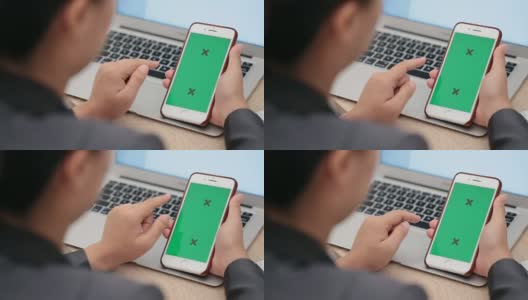 女商人滑一个绿色屏幕的智能手机高清在线视频素材下载