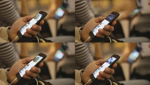 男子在机场使用智能手机的特写高清在线视频素材下载