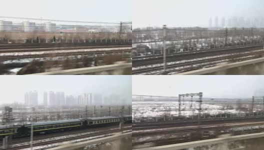 中国北京，高铁窗外的城市景观。高清在线视频素材下载