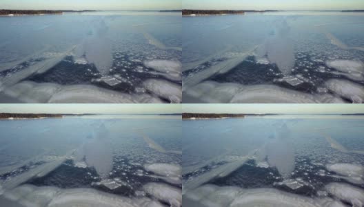 阳光慢慢地融化了芬兰海面上的冰高清在线视频素材下载