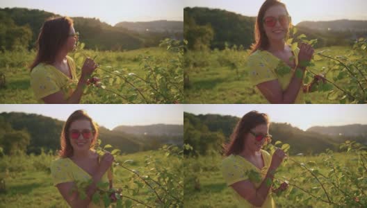 年轻女子在高原的田园中享受大自然高清在线视频素材下载