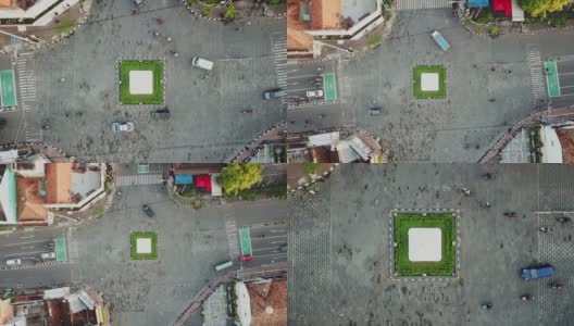 日惹,印尼。2018年1月9日:从无人机上向上飞行，俯视图的镜头与Jogja纪念碑的路口。拍摄分辨率为4k高清在线视频素材下载