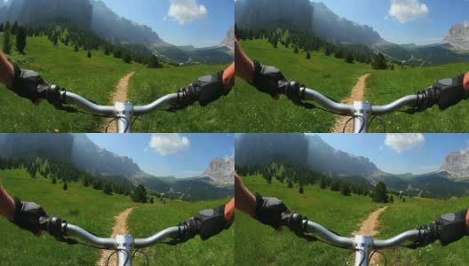 骑自行车下山是一条高山小径高清在线视频素材下载