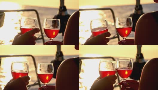 日落时分，在帆船上举杯祝酒高清在线视频素材下载