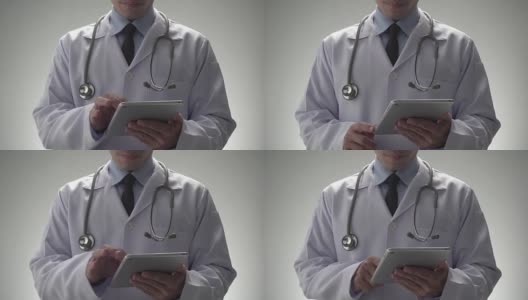 医生使用平板电脑高清在线视频素材下载
