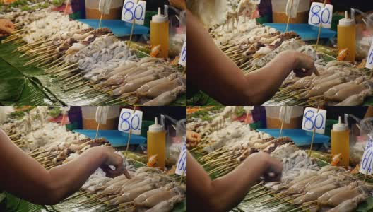 国家亚洲风情海鲜串在宗田街夜市的橱窗里。泰国芭堤雅高清在线视频素材下载