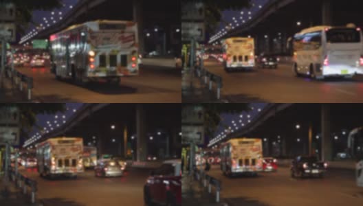 泰国交通巴士和汽车在城市模糊模式高清在线视频素材下载
