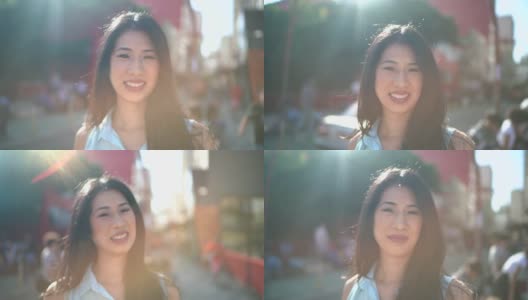微笑的亚洲女人肖像在城市高清在线视频素材下载