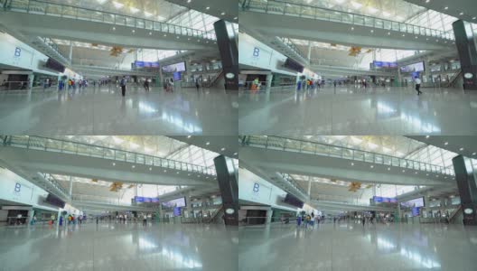 人群，乘客，在香港国际机场以建筑框架结构为旅游，交通，或度假的概念背景。高清在线视频素材下载