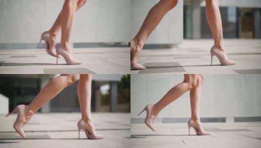 特写:美丽的女人的腿在高跟鞋走在城市的街道上。一位女商人在办公室中心附近的市中心散步。缓慢的运动。高清在线视频素材下载