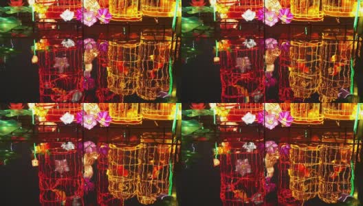 中国节日的灯笼在晚上装饰在河上高清在线视频素材下载