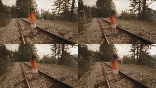 一个小女孩享受她的第一次火车旅行。山景窗外。高清在线视频素材下载