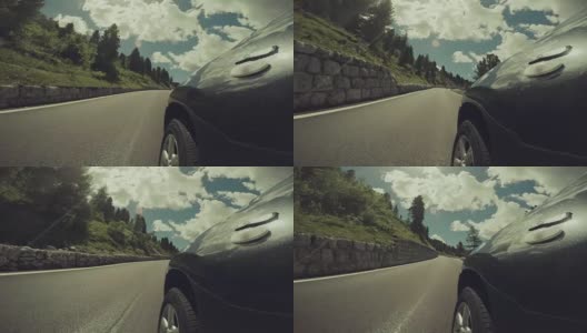 汽车行驶在欧洲阿尔卑斯山的白云石上高清在线视频素材下载
