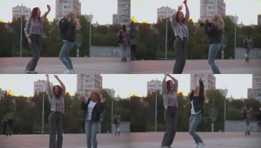 有趣的户外畅快舞蹈妇女聚会城市高清在线视频素材下载