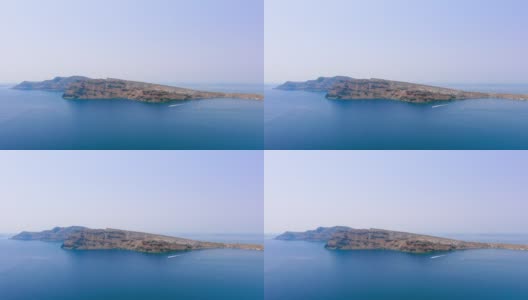 希腊圣托里尼岛:从空中俯瞰蒂拉(锡拉)岛，地中海蔚蓝清澈的海水——从空中俯瞰欧洲全景高清在线视频素材下载