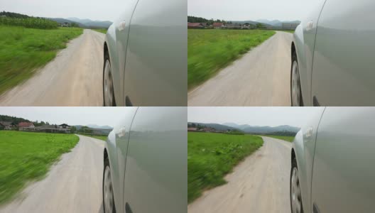 高清:运动模糊的汽车行驶在碎石路上高清在线视频素材下载