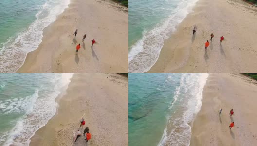 一群冲浪者在沙滩上玩4K高清在线视频素材下载