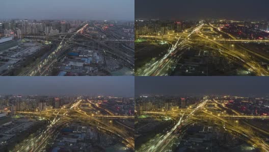 T/L WS HA PAN鸟瞰图北京路交叉口，黄昏到夜晚过渡/北京，中国高清在线视频素材下载