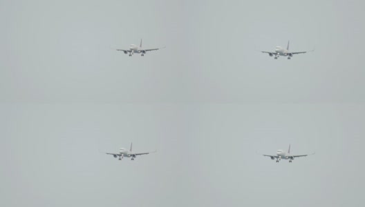 飞机在灰色的低空中飞行高清在线视频素材下载