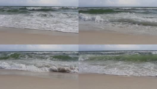 海岸的海浪拍打在沙滩上高清在线视频素材下载