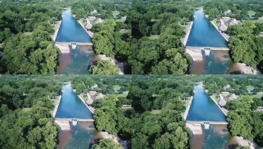 美国德克萨斯州奥斯汀市巴顿斯普林斯向着令人惊叹的蓝色游泳池前进高清在线视频素材下载