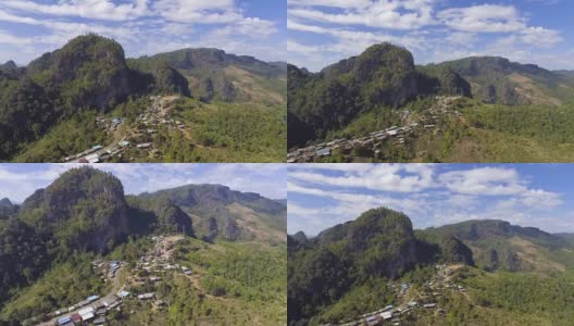 鸟瞰图的小村庄在山的边缘，美丽的山峰在早晨高清在线视频素材下载