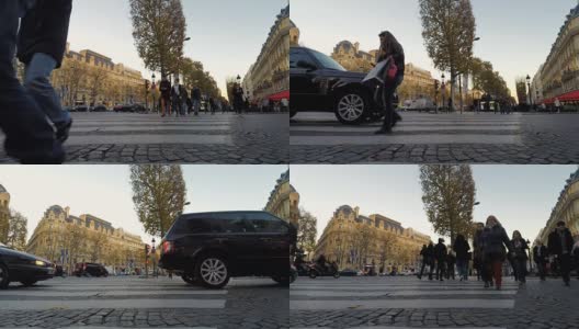 日落时分巴黎香榭丽舍大街上的交通和行人高清在线视频素材下载