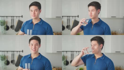 亚洲活跃的强壮男子在厨房喝干净的水的肖像。吸引人的口渴男性将水倒进玻璃杯，在醒来后喝一口天然矿物质，为家庭的健康和幸福。高清在线视频素材下载