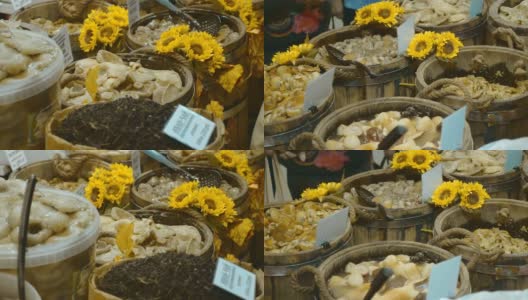 在俄罗斯，市场上出售用橡木桶腌制过冬的各种蘑菇高清在线视频素材下载