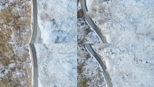 汽车行驶在积雪的高速公路上高清在线视频素材下载