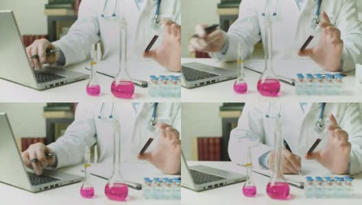 多利拍摄的是一名医生的手在试管里拿着血样——他在实验室里写报告高清在线视频素材下载
