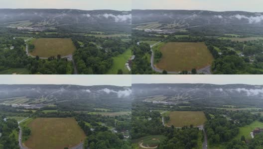 无人机拍摄的蓝山被低云覆盖，波科诺斯，宾夕法尼亚州，凌晨。高清在线视频素材下载