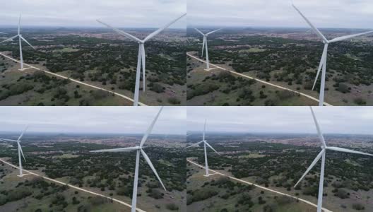 一个多云有风的一天在风力涡轮机农场在得克萨斯州中部，美国无人机的涡轮机侧pan的视图线高清在线视频素材下载