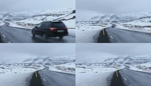 平移拍摄:道路延伸冰岛冬季景观雪山高清在线视频素材下载