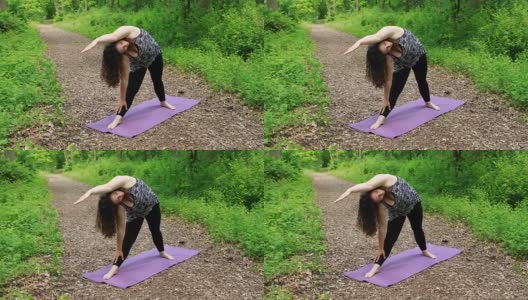 做瑜伽的女人-伸展的侧角姿势高清在线视频素材下载