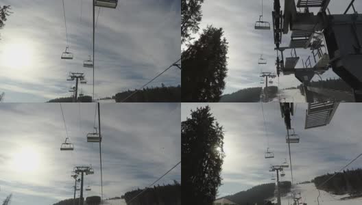 以天空为背景的滑雪缆车。高清在线视频素材下载