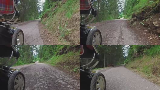 推着婴儿车走在山路上——Dolomites——意大利高清在线视频素材下载