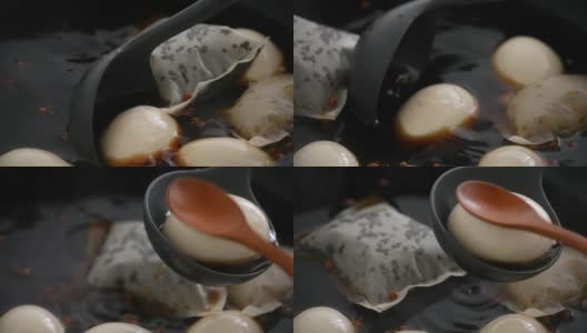在家烹饪传统的台湾食物茶叶蛋。高清在线视频素材下载