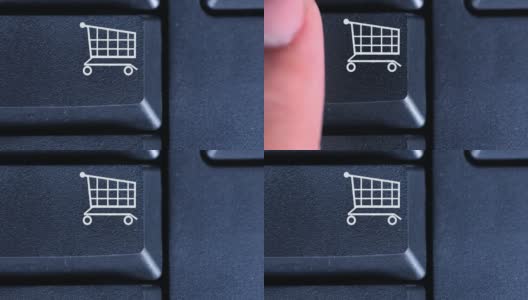 人体手指按下电脑键盘上购物车键的微距视频片段高清在线视频素材下载