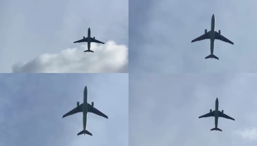 大型客机在阴天飞行的剪影。高清在线视频素材下载