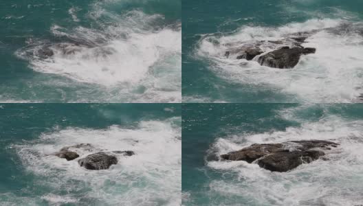 海浪拍打着岩石。高清在线视频素材下载
