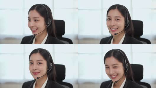 呼叫中心smiley亚洲商务女接待员戴耳机视频会议电话，在电脑上通过网络摄像头在网上聊天，客户支持服务。高清在线视频素材下载