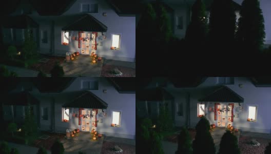 HD起重机:在晚上有万圣节装饰的房子高清在线视频素材下载