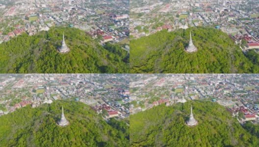 俯瞰Phra Nakhon kiri历史公园或Khao Wang, Phetchaburi城市小镇的森林树木和绿色的小山。自然景观背景，泰国。高清在线视频素材下载