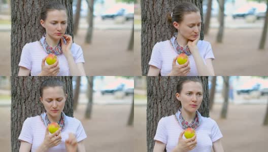 喉咙痛的年轻女子吃苹果高清在线视频素材下载