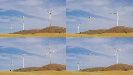 山上的风力发电机在风中转动高清在线视频素材下载