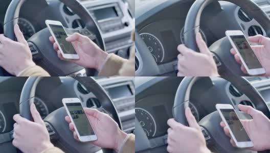 年轻的亚洲人在车里有手机高清在线视频素材下载