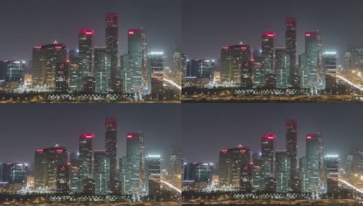 T/L MS HA ZO Illuminated skyscraper at night /北京，中国高清在线视频素材下载