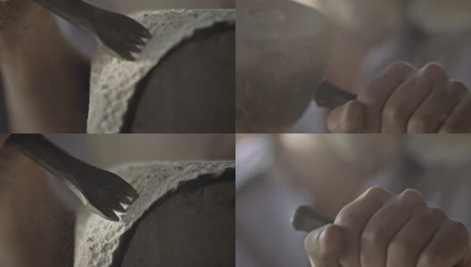 石匠用锤子和凿子雕刻石头高清在线视频素材下载